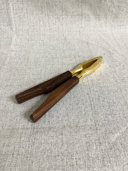 Nutcracker in brass and walnut